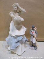 Front view of both Royal Doulton figurines