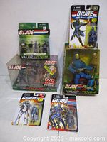 Group shot of all seven sealed G.I. Joe packages