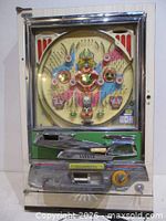 Full frontal view of Daiwa pachinko machine showing entire cabinet and playfield