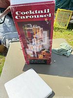 Front of product box showing Cocktail Carousel and 6-Bottle Dispenser text