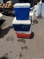 Stacked view of the three coolers showing colors and attached lids