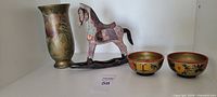 group shot vase, rocking horse, two bowls