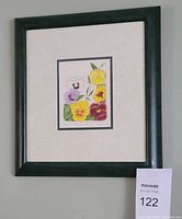 Full view of framed Garden Pansy print on wall