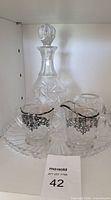 Full lot showing decanter, creamer, sugar bowl on tray