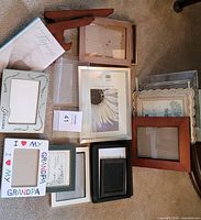 Group shot showing all frames, book and easel