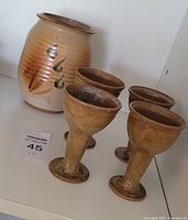Group shot of vase and four goblets