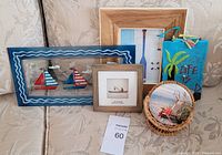 Group shot displaying all artworks, decor block and coaster set