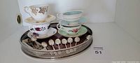 Overall view of tray with cups and spoons