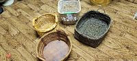 Four baskets on floor showing shapes and colors