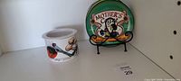 Dip cooler dish beside Mother’s Coffee plate on stand