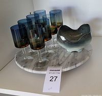 Full lot: 8 glasses, marble turntable, grey bowl