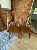 both wooden hoop back chairs front view