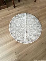 Full view of round rug on floor