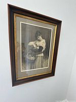 Full view of framed print on wall