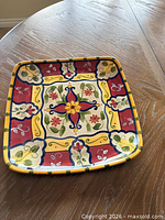 Top view of Pier 1 Vallarta square plate showing full hand-painted design