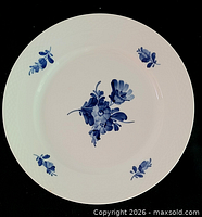 Front view showing blue floral design and overall condition