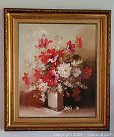 Front view of entire framed painting showing floral subject