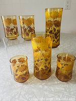 Six Libbey Daisies glasses showing two tall coolers and four juice glasses