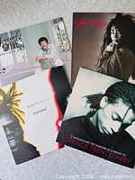 Group shot of all four album covers