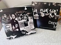 Front covers of both Depeche Mode vinyl records