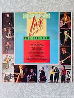 Front cover showing title and artist list