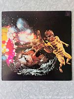 Front cover with cosmic striped child artwork
