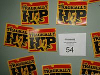 Multiple The Tragically Hip logo stickers displayed front side