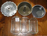 All bakeware items arranged on floor