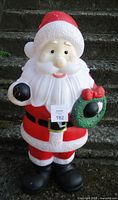 Front view of 36" blow mold Santa Claus holding wreath