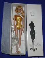 Doll in original box with accessories visible
