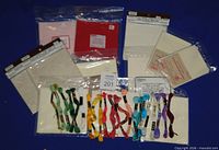 All cloth packs and embroidery thread displayed