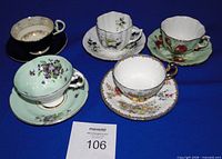 Group shot of all five teacup and saucer sets