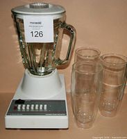 Blender base with glass pitcher and three double-walled glasses