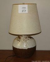 Full view of lamp unlit showing overall form and shade