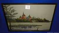Full view of framed needlepoint
