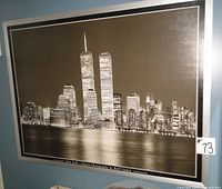 Full view of framed NYC Twin Towers print in silver frame