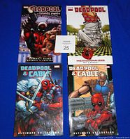 All four Deadpool and Deadpool & Cable graphic novels front covers displayed