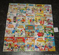 Twenty Archie digest and double digest comics laid out in four rows