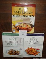 Three cookbooks standing: Best American Side Dishes, The Best 30-Minute Recipe, Best Vegetable Recipes