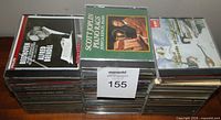 Stack of CDs showing front titles including Beethoven, Scott Joplin, Handel etc.