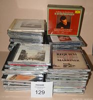 Stacks of jewel case CDs showing Beethoven 9 Symphonies box and others
