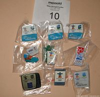 All nine Vancouver 2010 pins in sleeves