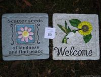 Front view of both resin plaques showing designs and inscriptions