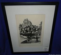 Full view of framed lithograph within black frame and mat