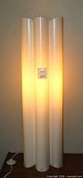 Lamp illuminated showing cylindrical design