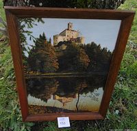 Front view of framed painting showing castle and reflection