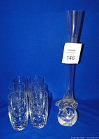 Group shot of all items: six glasses, tall vase, paperweight