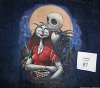 Back of denim jacket showing Jack Skellington and Sally graphic