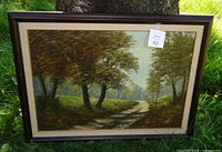 Front view of framed landscape painting