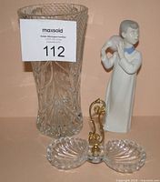 Front view of all three items: figurine, crystal vase, divided dish